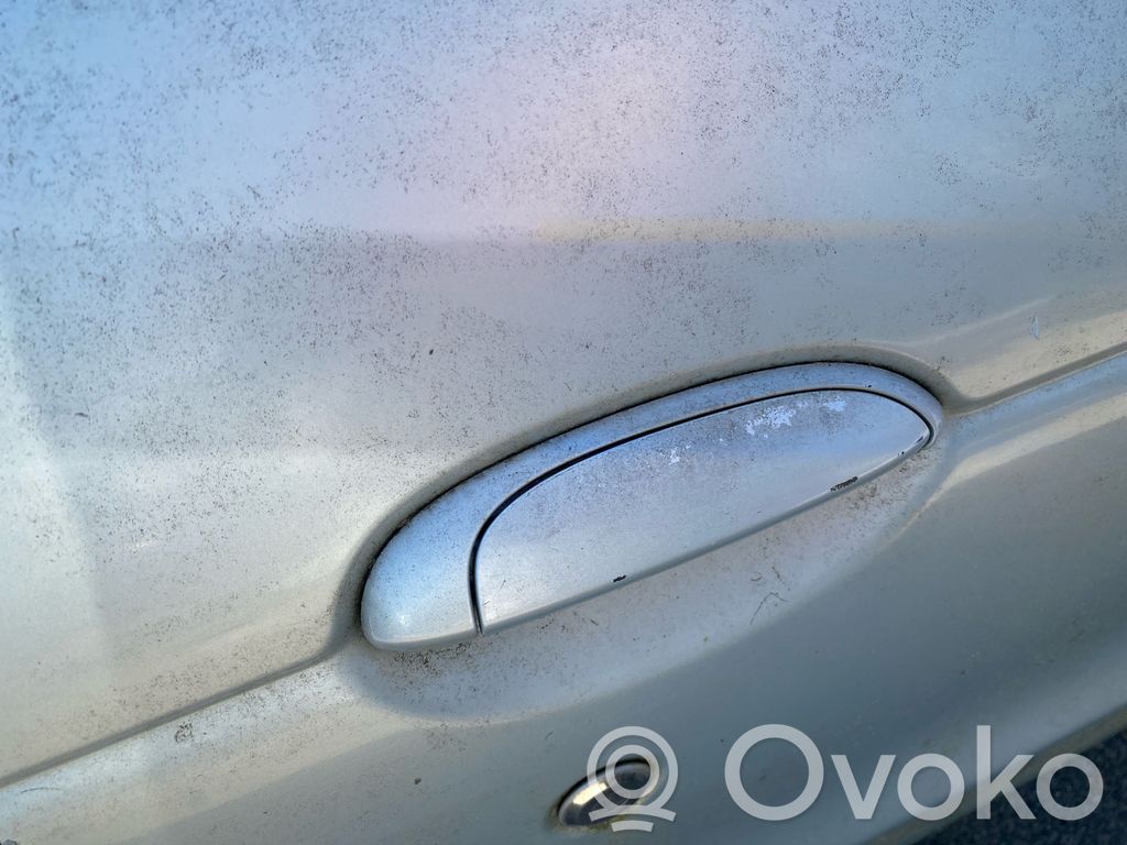 Renault Megane I Mâner exterior ușă față 