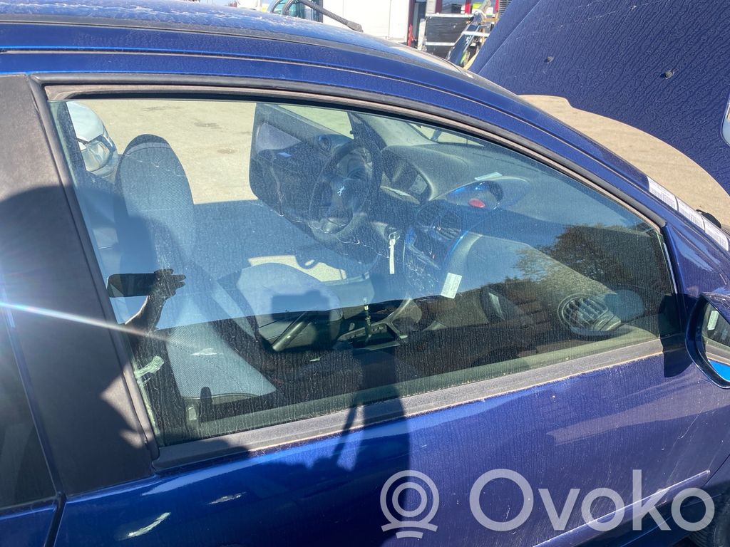 Peugeot 206 Szyba drzwi przednich 