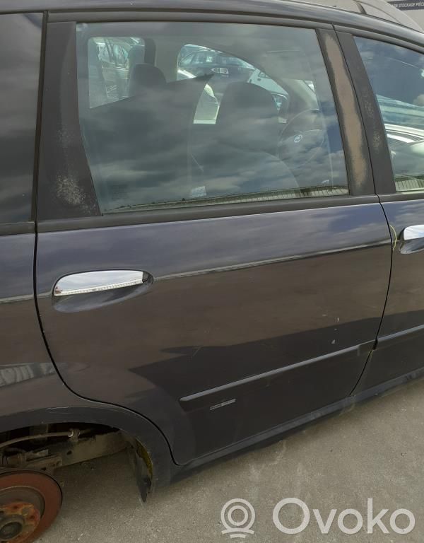 Fiat Croma Elektryczny podnośnik szyby drzwi tylnych 
