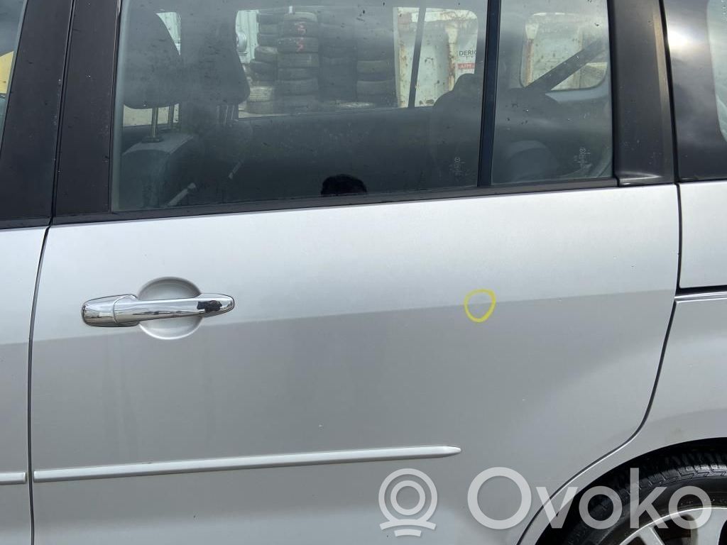 Mazda 5 Rear door lock 