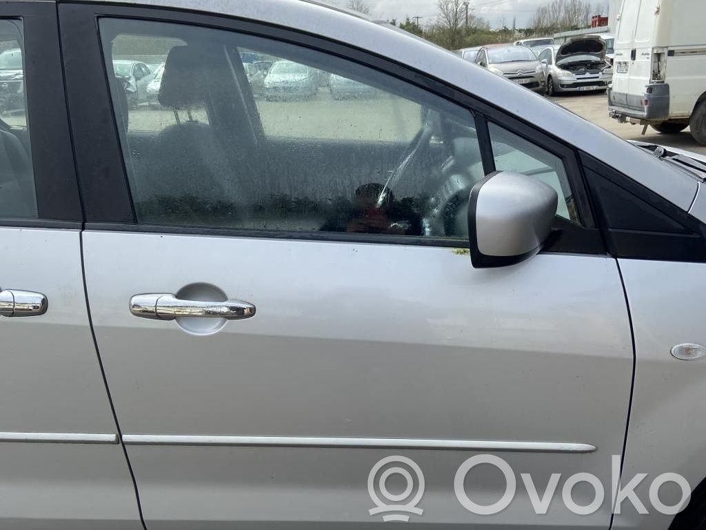 Mazda 5 Front door lock 