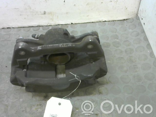 Volkswagen Golf VII Zacisk hamulcowy przedni 