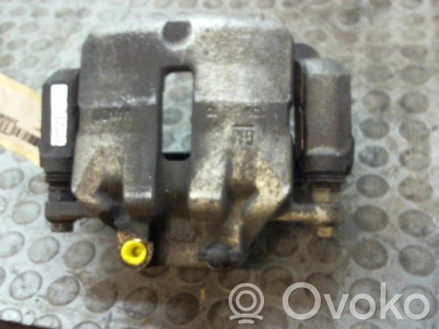 Opel Insignia A Zacisk hamulcowy przedni 