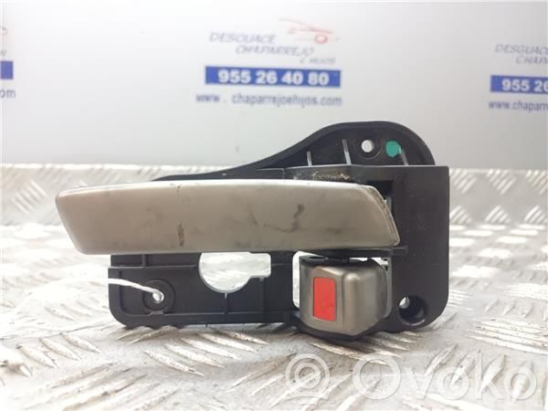 KIA Carens I Manecilla interna puerta delantera 
