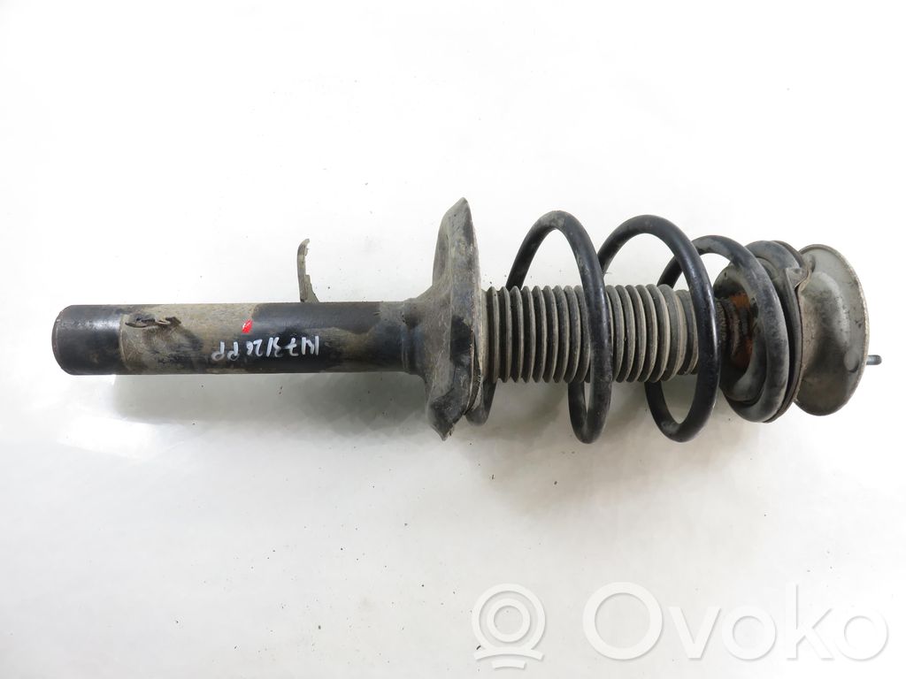 Front shock absorber with coil spring