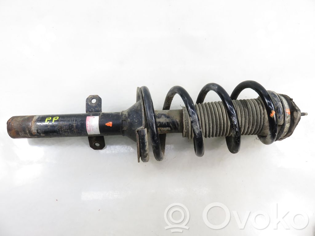 Front shock absorber with coil spring
