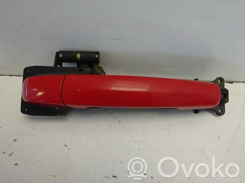 Suzuki Swift I Manecilla externa puerta delantera 