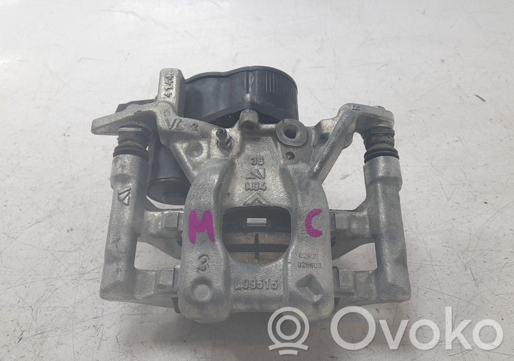 Toyota Yaris Mocowanie / Zacisk hamulca tylnego 