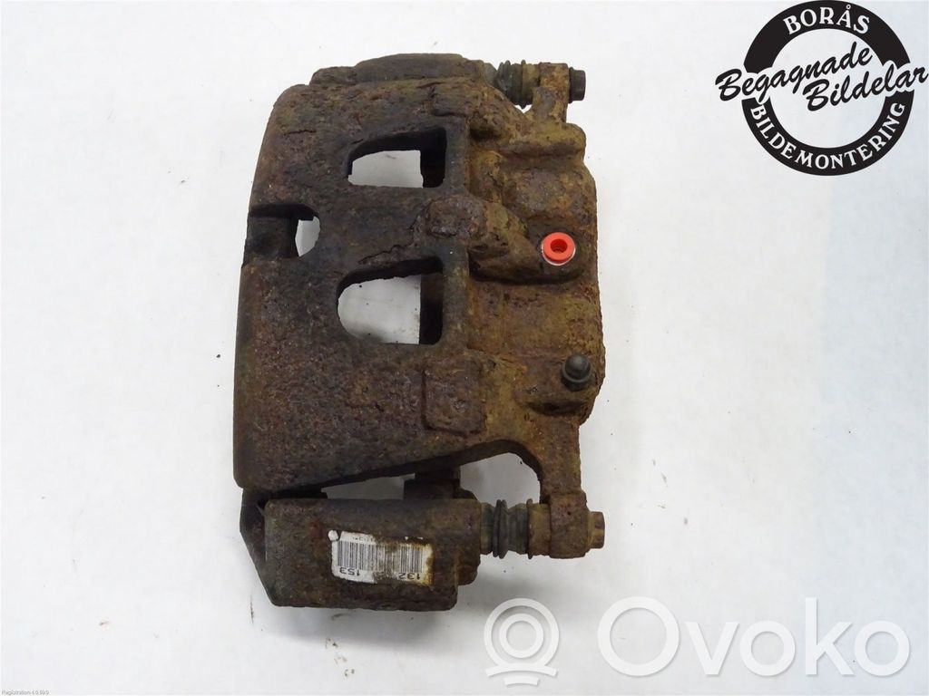 Opel Insignia A Zacisk hamulcowy przedni 