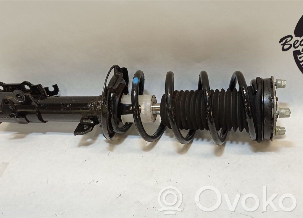 Ford Transit Courier Front shock absorber with coil spring 