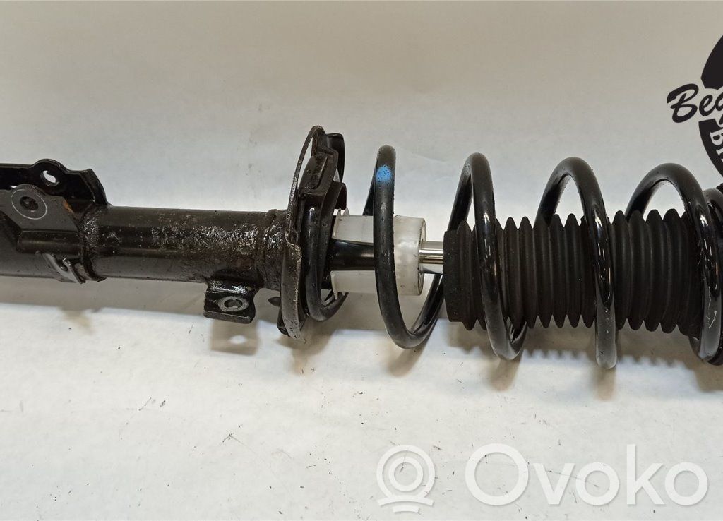 Ford Transit Courier Front shock absorber with coil spring 