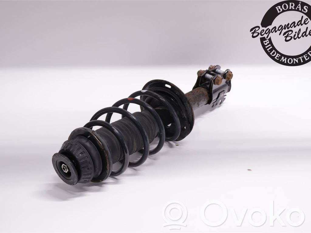 Toyota Yaris Amortyzator osi przedniej ze sprężyną 