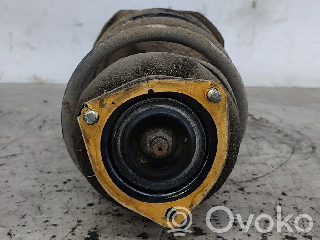 Nissan Almera N16 Amortyzator przedni