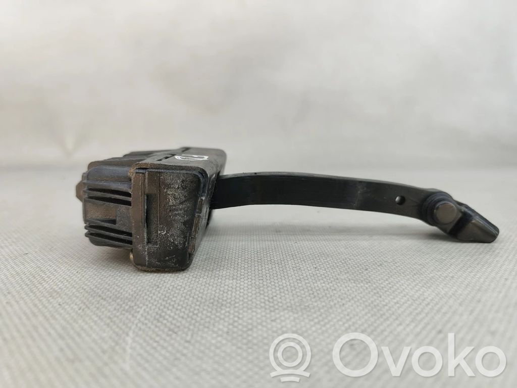 Front door check strap stopper   7176804