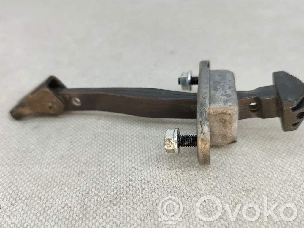 Front door check strap stopper   NV