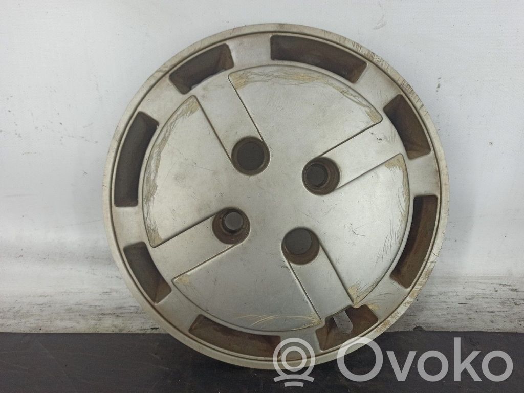Tapacubos original de rueda   7700713044,ARRANHADO