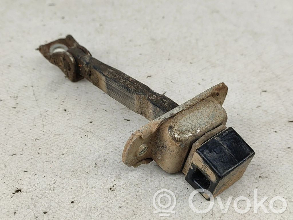Mitsubishi L200 Rear door check strap stopper