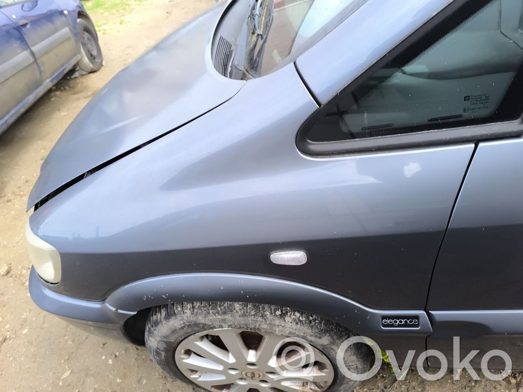 Opel Zafira A Błotnik przedni 
