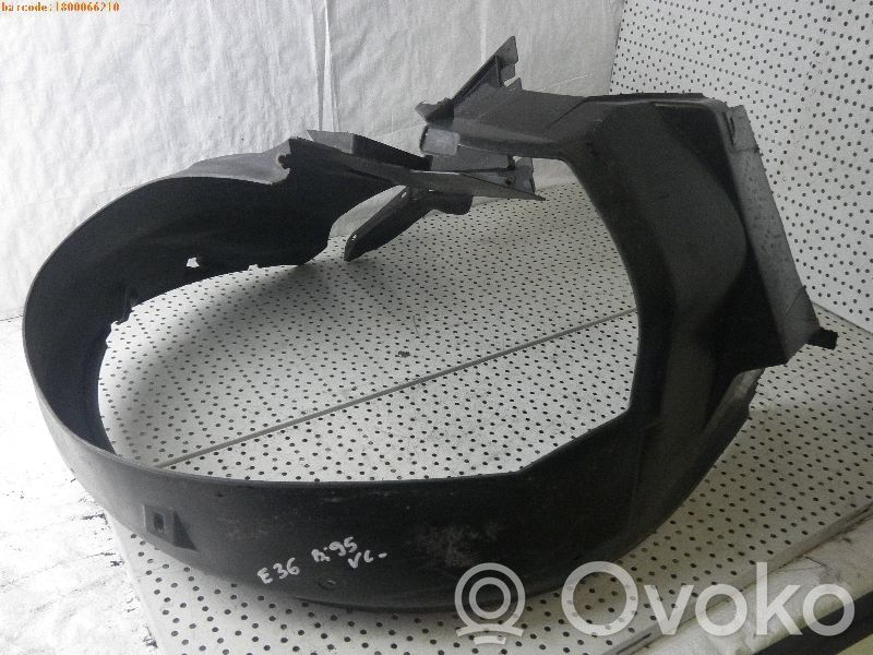 Front wheel arch liner splash guards