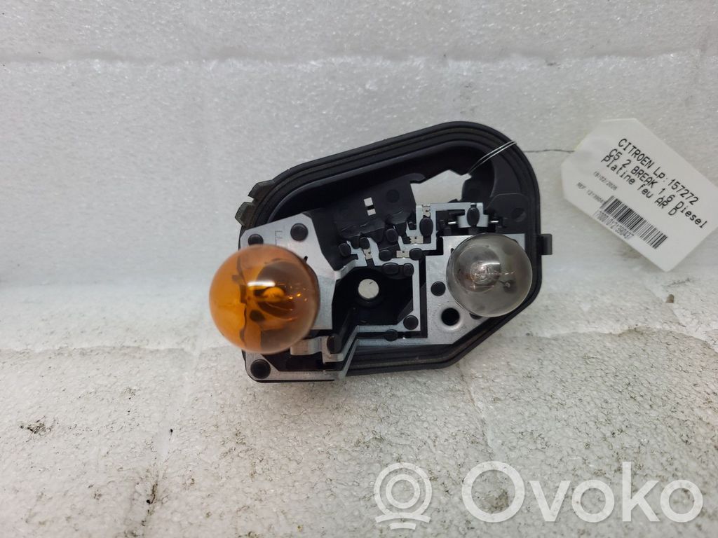 Citroen C5 Takavalon polttimon suojan pidike 
