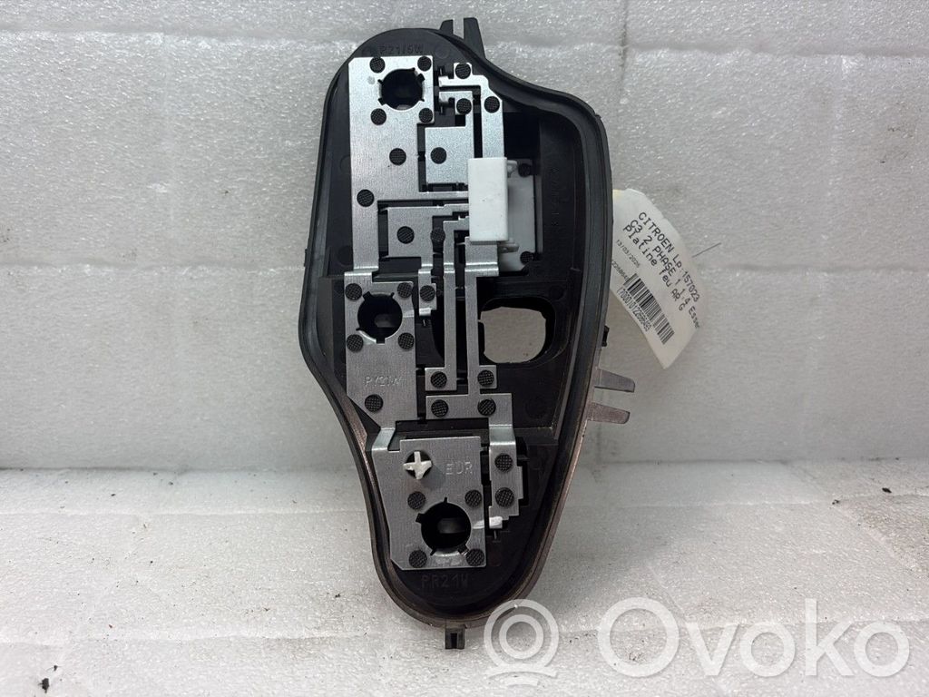Citroen C3 Takavalon polttimon suojan pidike 