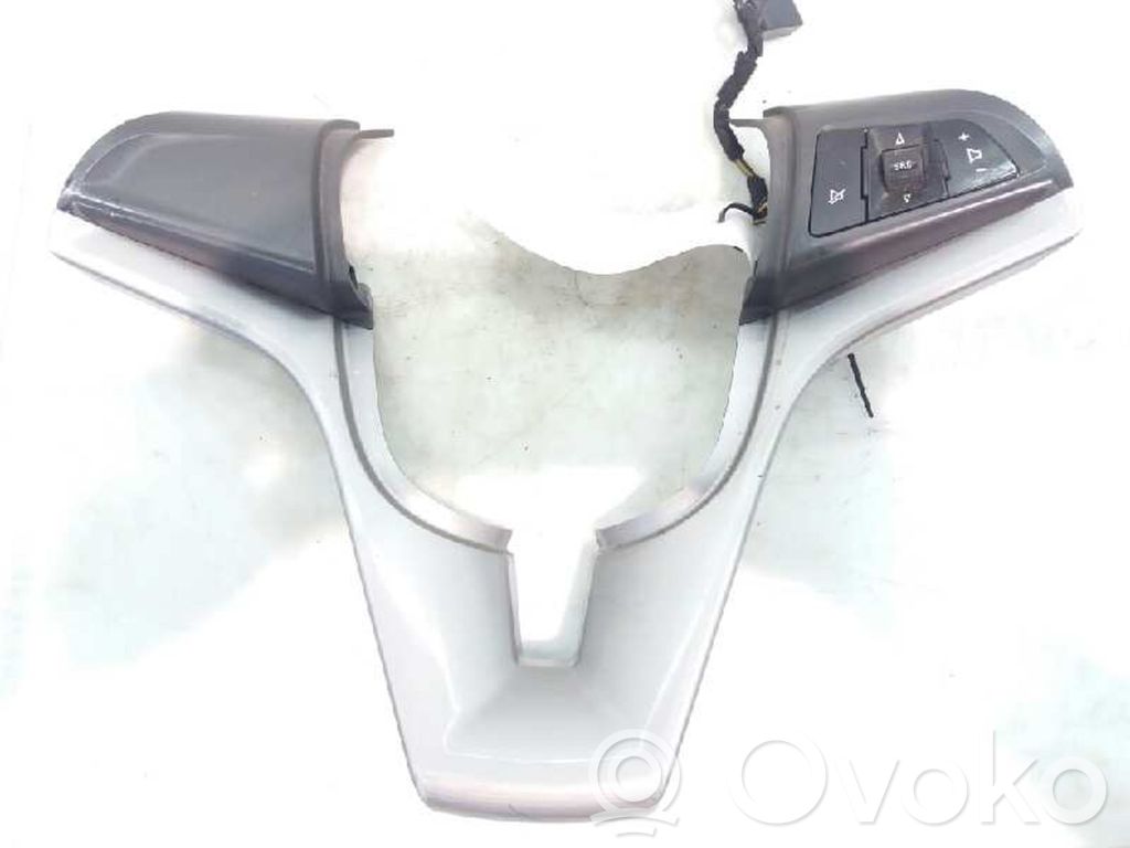 Chevrolet Corsa Butoane/comutatoare pe volan 
