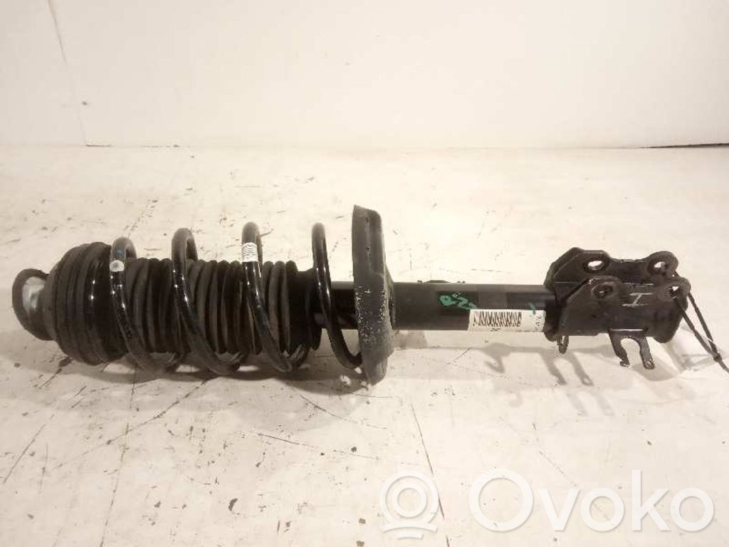 Opel Corsa D Amortyzator osi przedniej ze sprężyną 