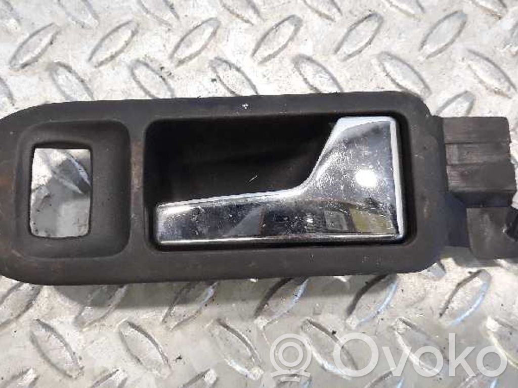 Manecilla interna puerta delantera