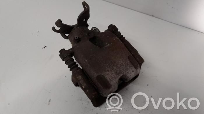 Opel Insignia A Tylny zacisk hamulcowy 