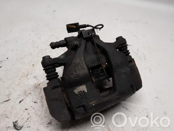 Opel Combo E Front brake caliper 
