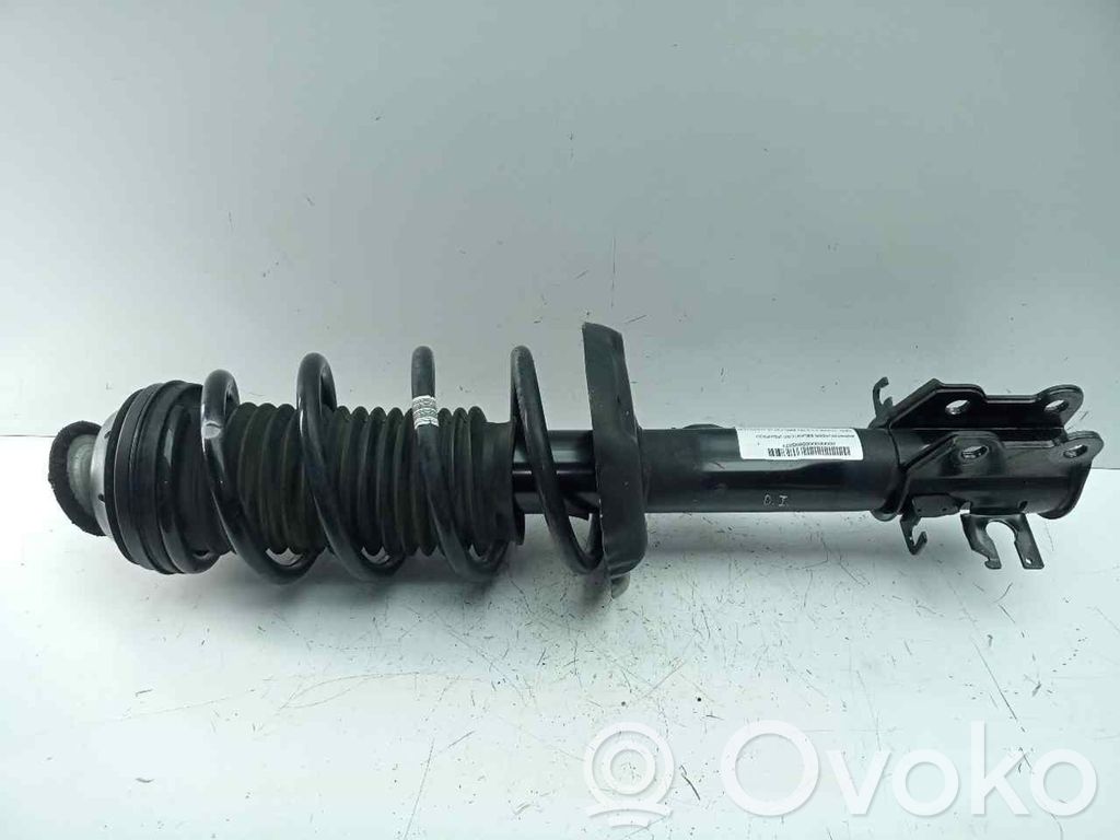 Opel Corsa D Etuiskunvaimennin kierrejousella 