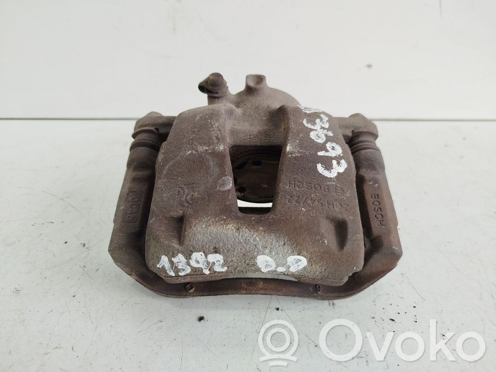 Opel Corsa D Front brake caliper 
