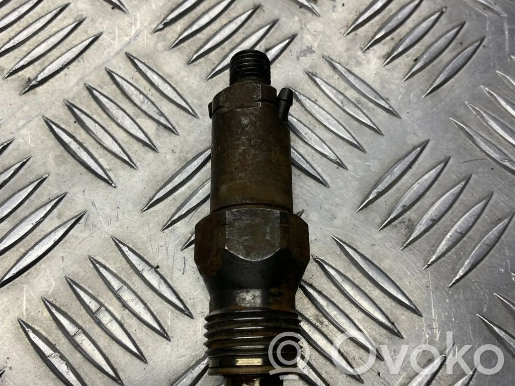 Inyector de combustible   6735401D