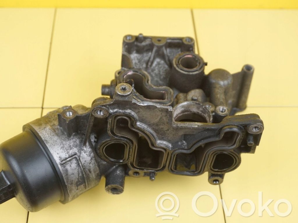 Opel Corsa E Oil filter mounting bracket 