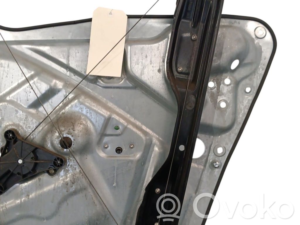 Volkswagen Tiguan Elektryczny podnośnik szyby drzwi przednich 