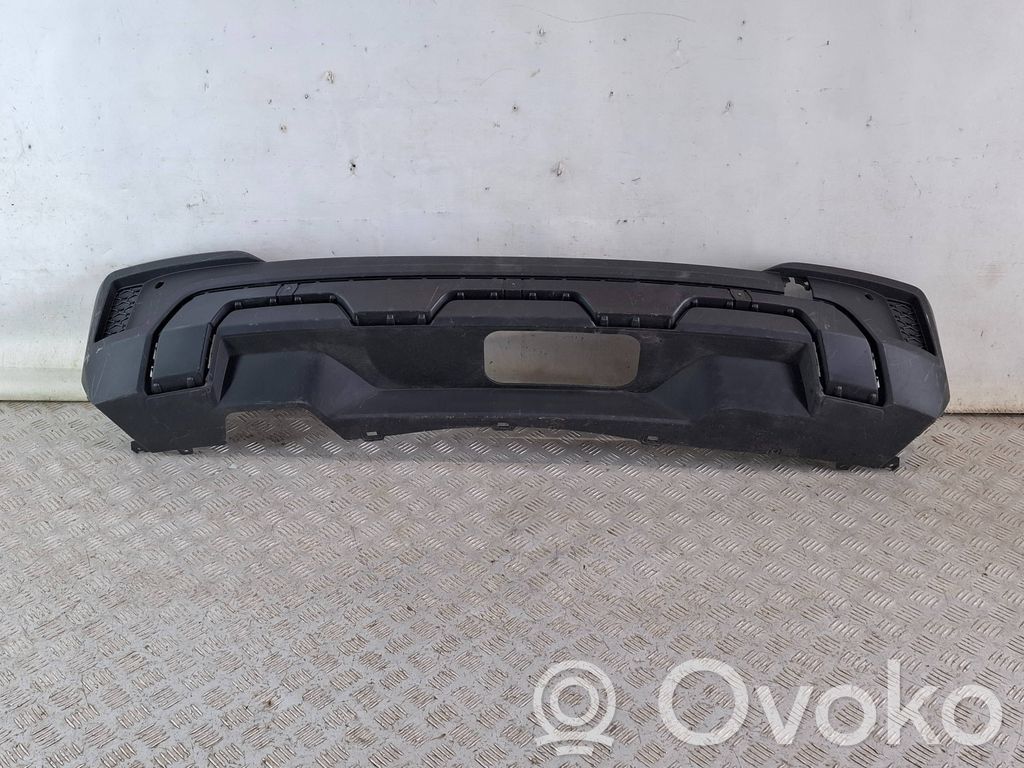 Skoda Kamiq Moldura inferior del parachoques trasero 