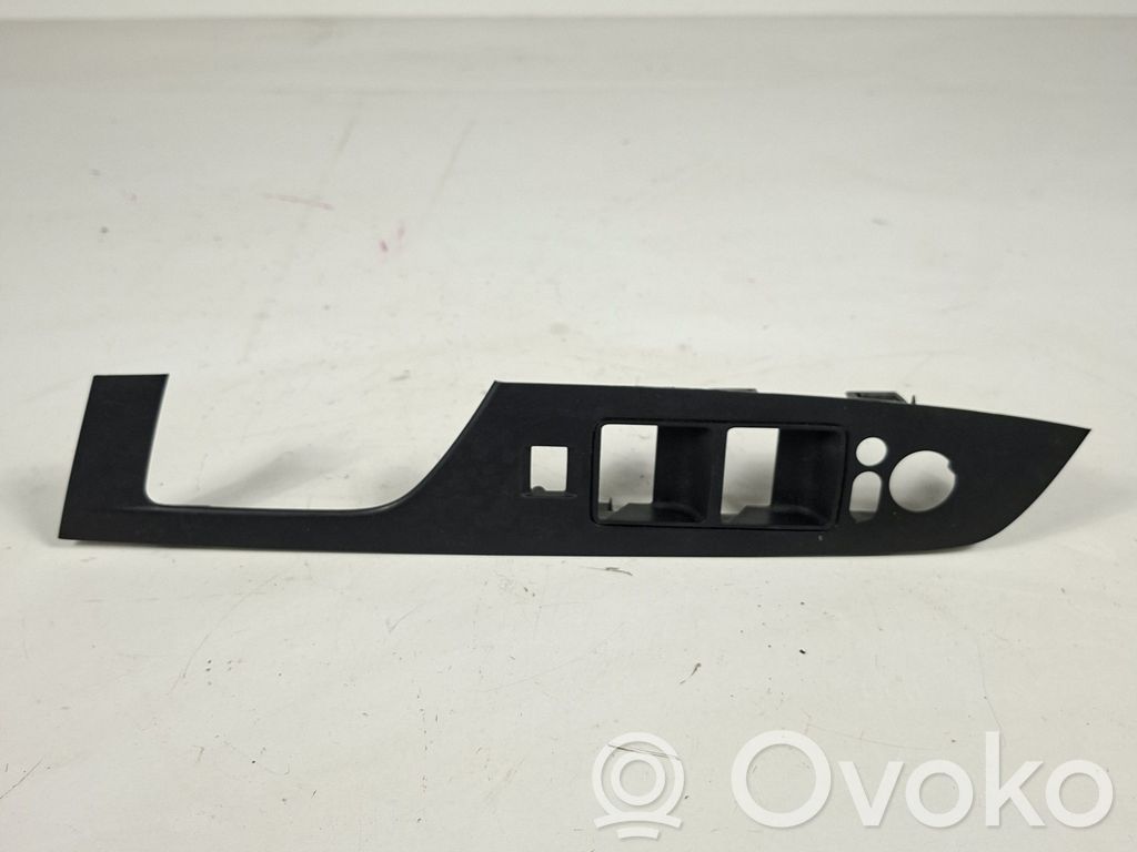 Mazda 6 Front door window switch trim 