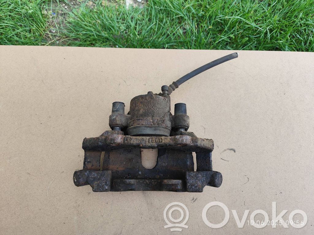 Mazda 3 II Caliper de freno delantero 