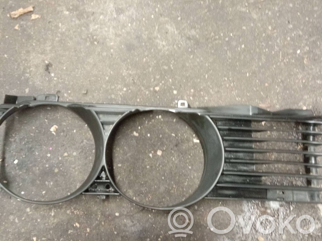 Under headlight/headlamp trim   1938426