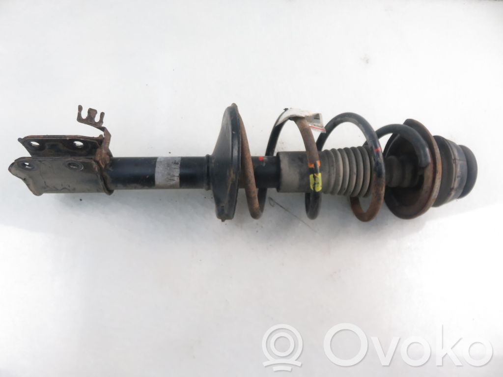 Dacia Logan I Front shock absorber with coil spring