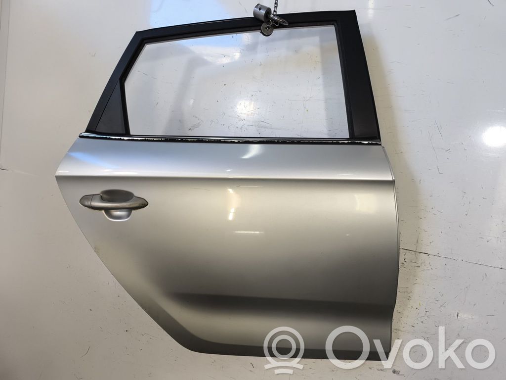KIA Carens III Porte arrière