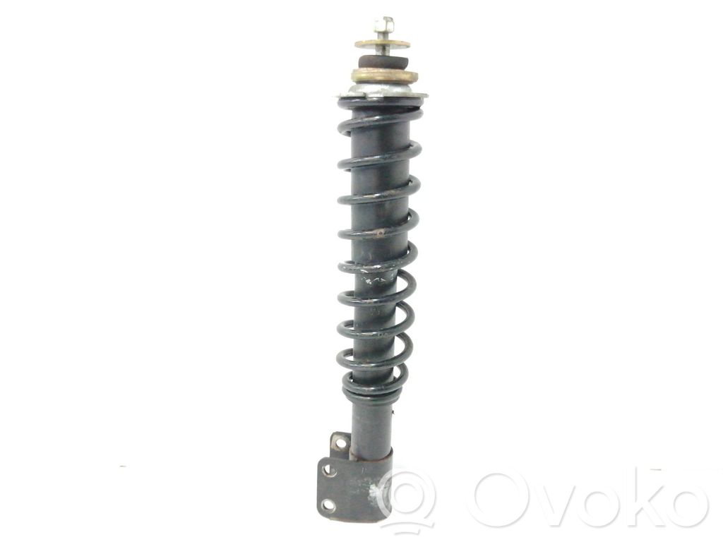 Front shock absorber with coil spring