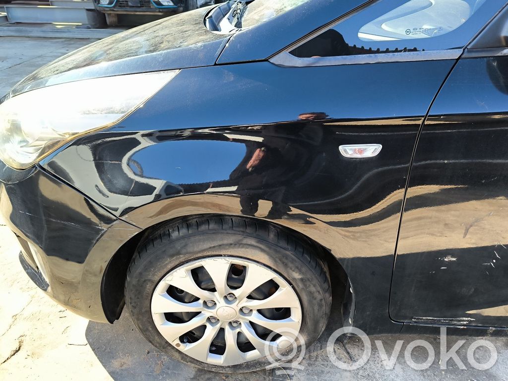 KIA Carens III Guardabarro 