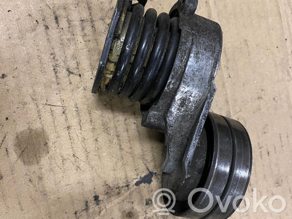 Opel Astra H Tensor de correa del alternador 