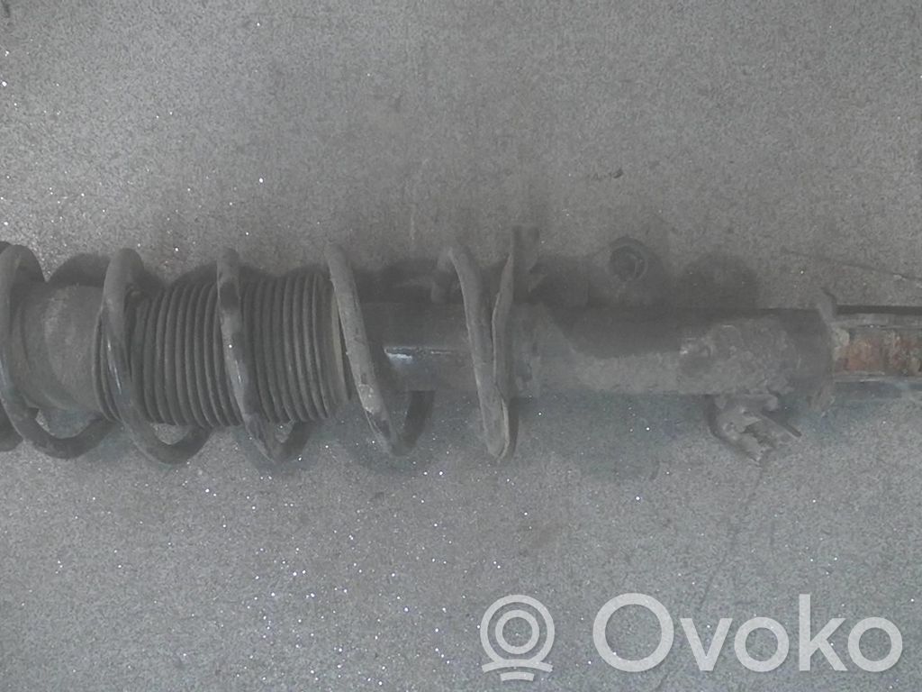 Nissan Note (E12) Front shock absorber with coil spring 
