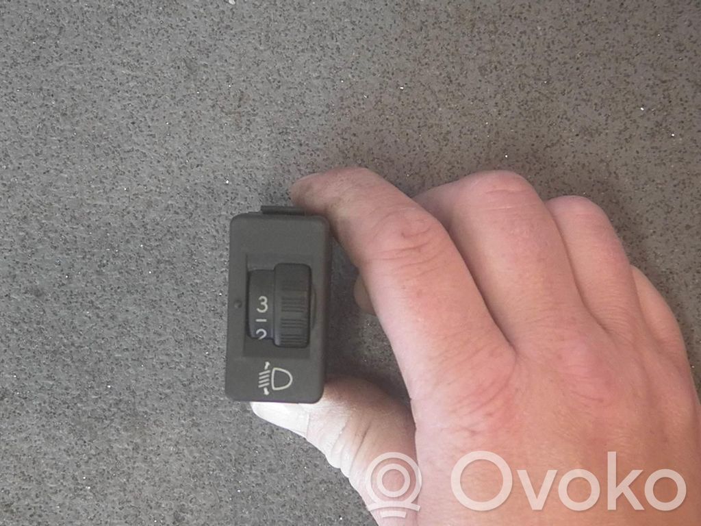 Headlight level height control switch
