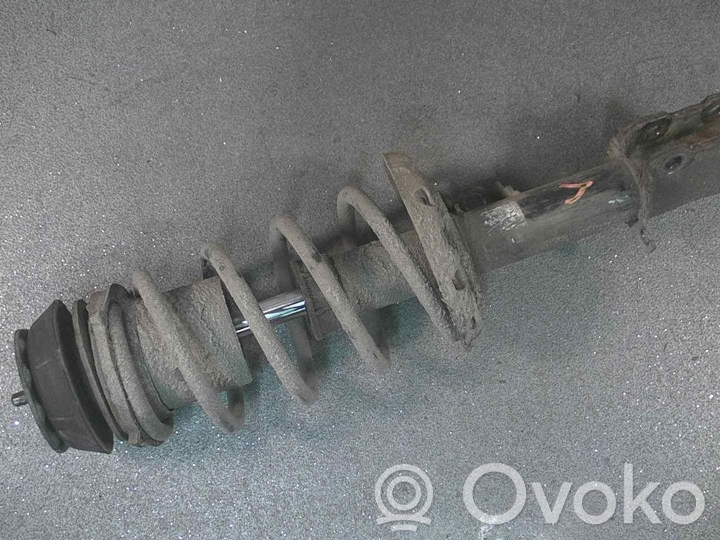 Front shock absorber with coil spring