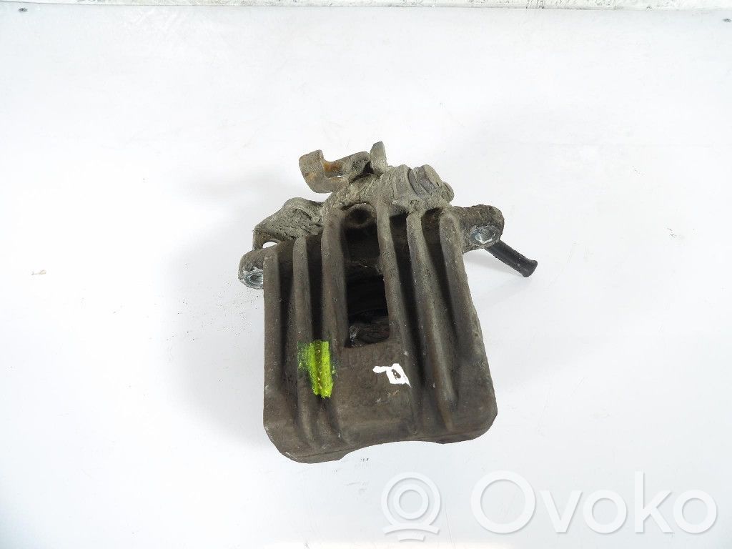 Volkswagen Golf IV Tylny zacisk hamulcowy 
