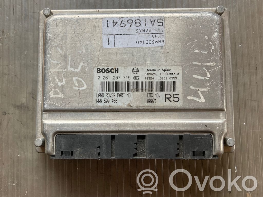 Engine control unit/module   0261207715,NNN500400,1039E00710