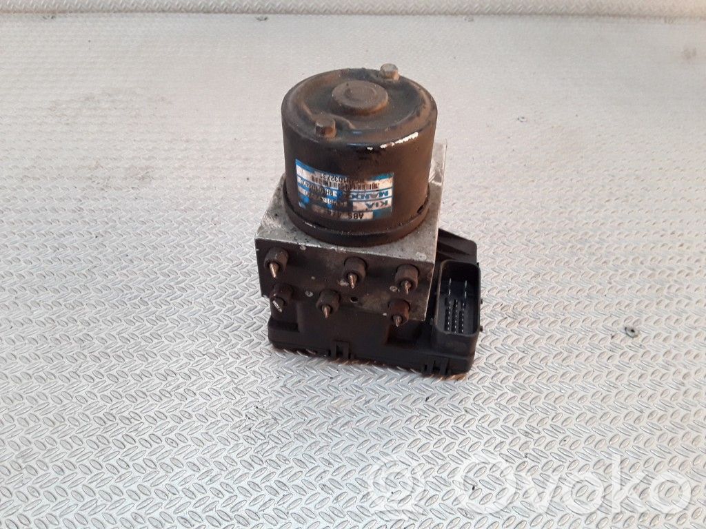 Блок ABS   0K56T437AE